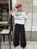 DAXUEN White short-sleeved crew neck graphic T-shirt — model photo