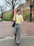 DAXUEN Bold Hair Clip Graphic T-Shirt | DAXUEN — model photo