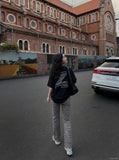 DAXUEN black oversized bold-hand-drawn graphic tee — model photo