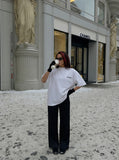 DAXUEN Oversized short-sleeve t-shirt with letter graphic — model photo