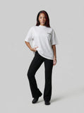 DAXUEN Oversized short-sleeve t-shirt with letter graphic — model photo