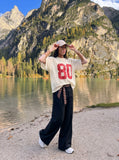 DAXUEN Oversized short-sleeved mesh jersey top — model photo
