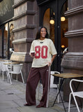 DAXUEN Oversized short-sleeved mesh jersey top — model photo