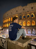 DAXUEN royal blue oversized multi-line serif graphic t-shirt — model photo