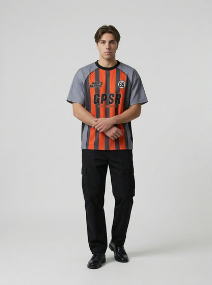 DAXUEN Multi-panel short-sleeved t-shirt in grey, black, and orange — model photo