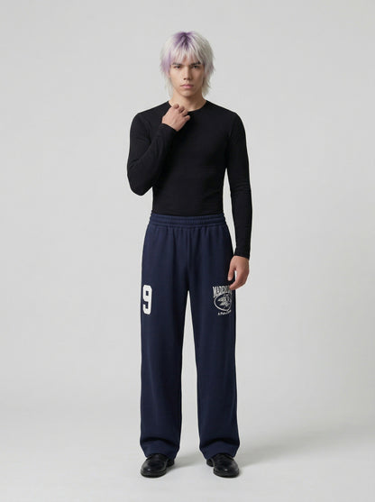 DAXUEN Wide leg sweatpants with numeral graphic — model photo
