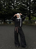 DAXUEN black knit polo with bold '7' graphic — model photo