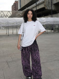 DAXUEN white oversized bold red graphic back t-shirt — model photo