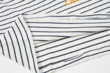 DAXUEN striped oversized polo shirt with bold script and denim appliqué