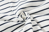 DAXUEN striped oversized polo shirt with bold script and denim appliqué