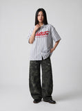 DAXUEN light grey and blue vertical striped button-up shirt — model photo