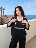 DAXUEN black oversized bold-serif wordmark v-neck t-shirt — model photo