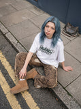 DAXUEN white oversized bold-stacked-text graphic tee — model photo