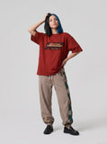DAXUEN white oversized bold-stacked-text graphic tee — model photo