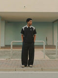 DAXUEN Short-sleeved polo shirt with striped panels — model photo