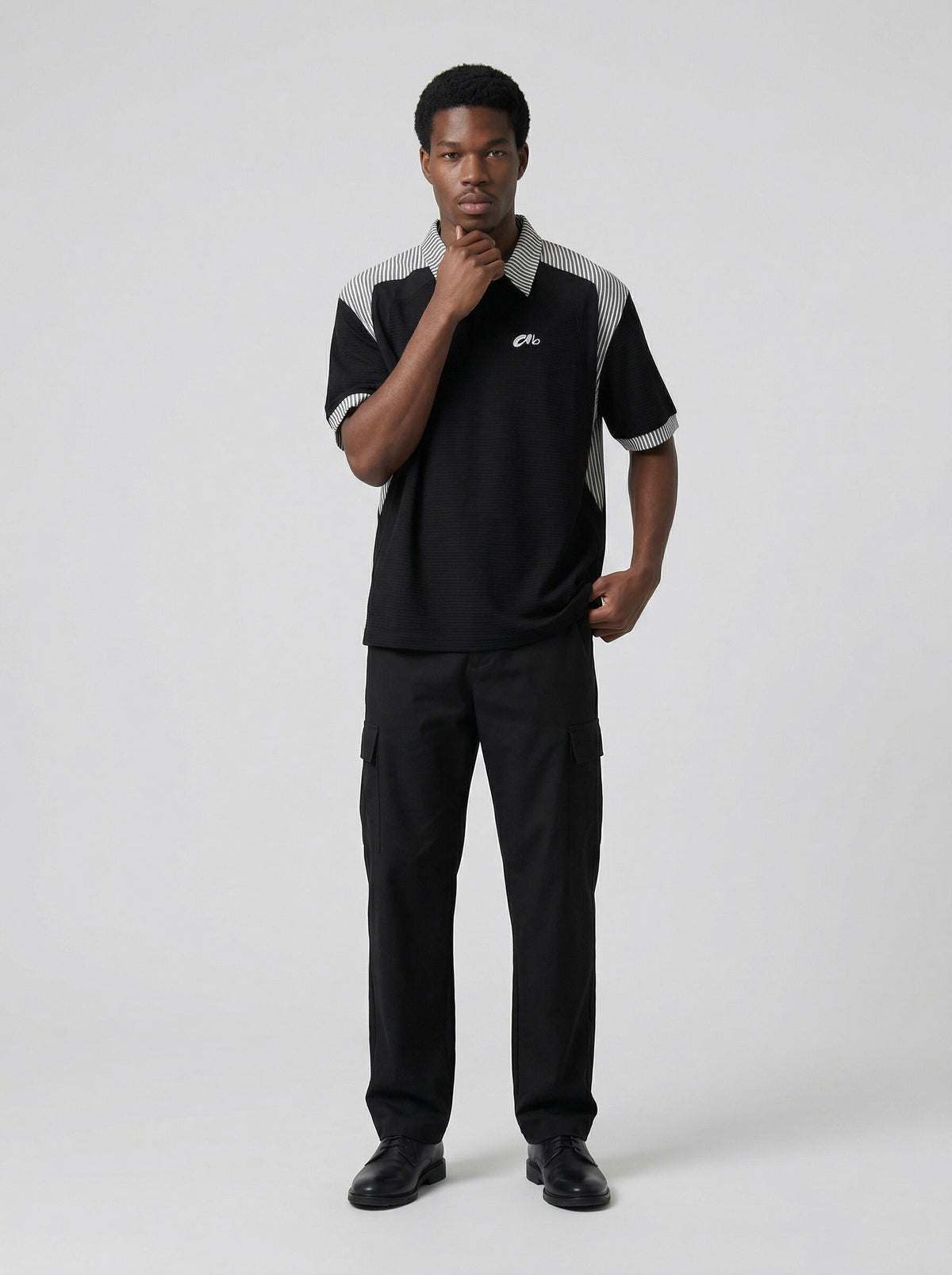 DAXUEN Short-sleeved polo shirt with striped panels — model photo