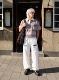 DAXUEN grey striped polo with number 23 graphic — model photo