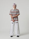 DAXUEN grey striped polo with number 23 graphic — model photo