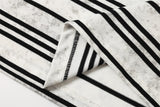 DAXUEN grey and black striped knit long-sleeve top
