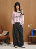 DAXUEN striped oversized long-sleeve top with 'LOKETTE' text — model photo