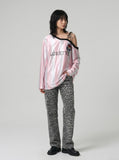 DAXUEN striped oversized long-sleeve top with 'LOKETTE' text — model photo