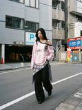 DAXUEN striped oversized long-sleeve top with 'LOKETTE' text — model photo