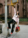 DAXUEN striped oversized long-sleeve top with 'LOKETTE' text — model photo