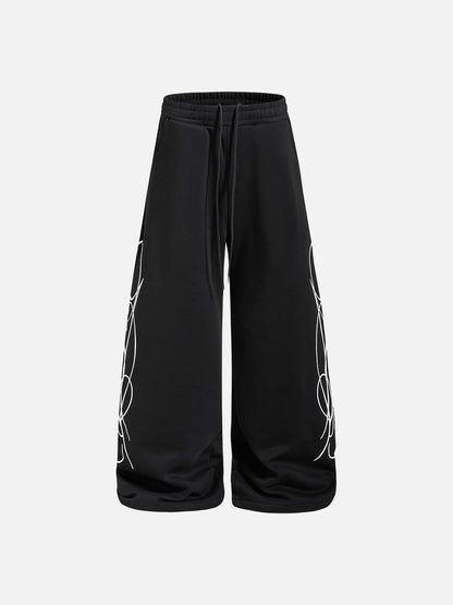 DAXUEN camouflage sweatpants with bold swirling graphics