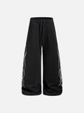 DAXUEN camouflage sweatpants with bold swirling graphics