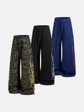DAXUEN camouflage sweatpants with bold swirling graphics