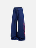 DAXUEN camouflage sweatpants with bold swirling graphics