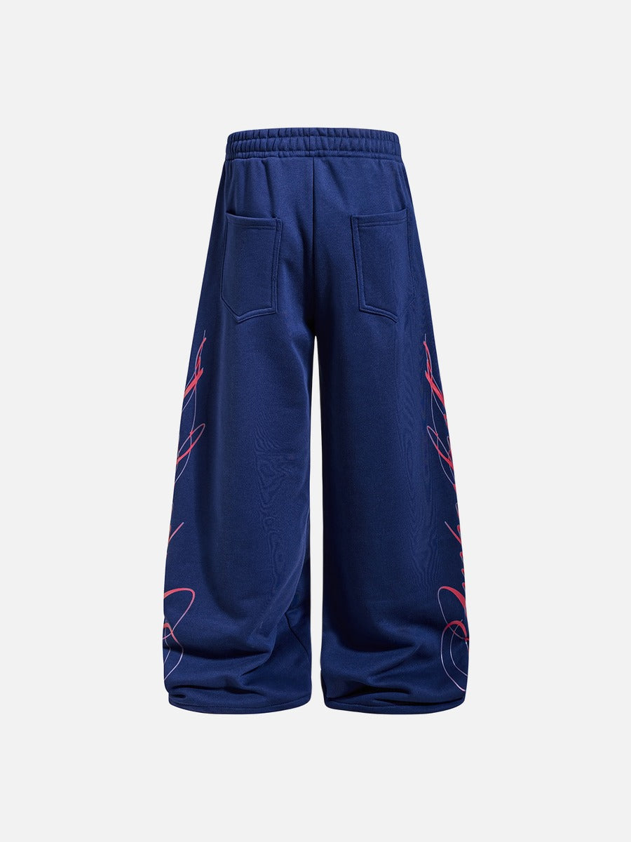 DAXUEN camouflage sweatpants with bold swirling graphics