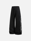 DAXUEN camouflage sweatpants with bold swirling graphics