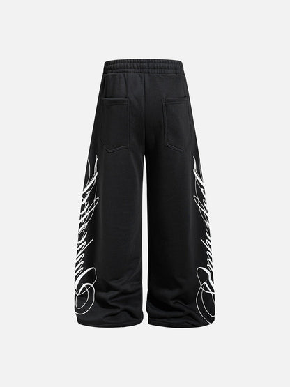 DAXUEN camouflage sweatpants with bold swirling graphics