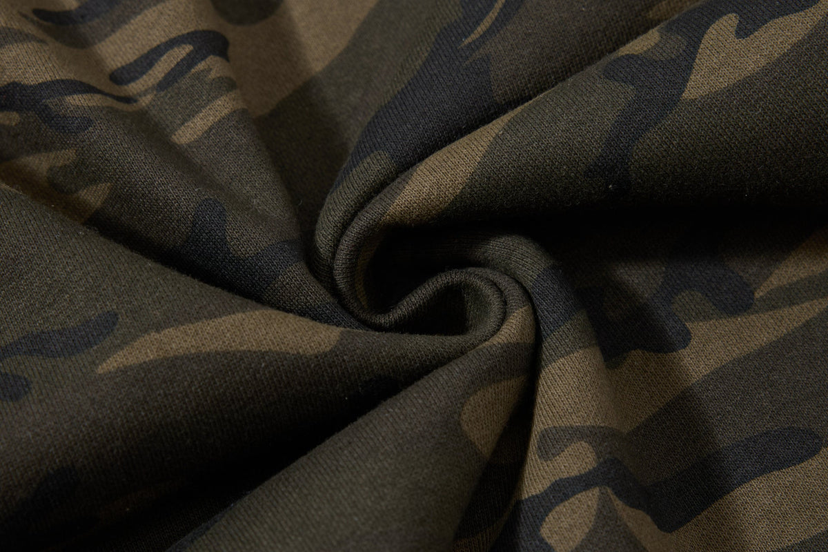 DAXUEN camouflage sweatpants with bold swirling graphics