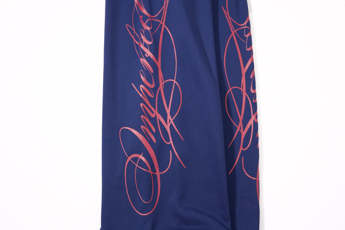DAXUEN camouflage sweatpants with bold swirling graphics
