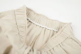 DAXUEN light beige wide-leg trousers with bold text graphic