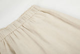 DAXUEN light beige wide-leg trousers with bold text graphic