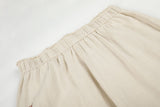 DAXUEN light beige wide-leg trousers with bold text graphic