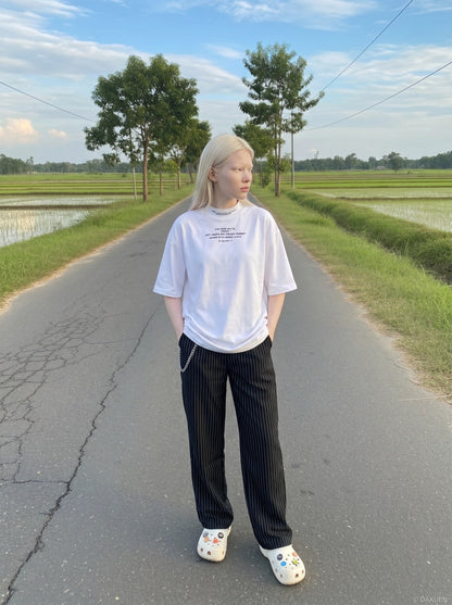 DAXUEN white oversized text graphic mock neck t-shirt — model photo