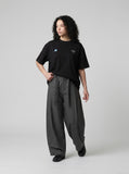 DAXUEN black oversized triangular graphic tee — model photo