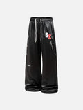 DAXUEN black satin wide-leg pants with bold two-letter graphic