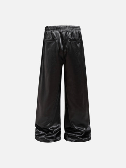 DAXUEN black satin wide-leg pants with bold two-letter graphic