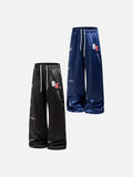 DAXUEN black satin wide-leg pants with bold two-letter graphic