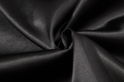 DAXUEN black satin wide-leg pants with bold two-letter graphic