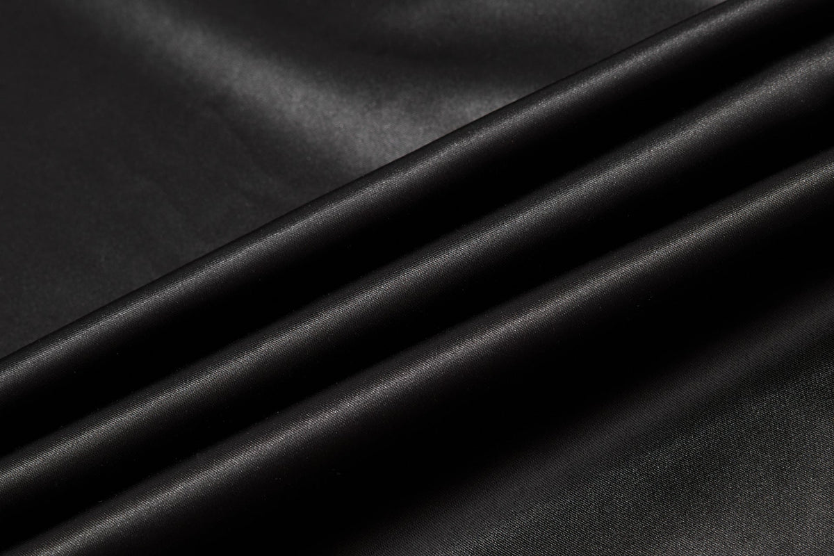 DAXUEN black satin wide-leg pants with bold two-letter graphic
