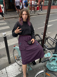 DAXUEN Midi-length skirt with utility pocket and zipper details — model photo