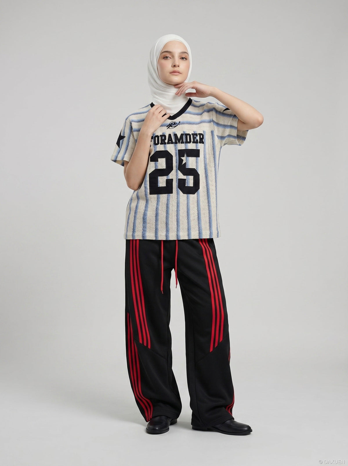DAXUEN Short-sleeved loose-fitting V-neck top with stripes and graphics — model photo