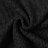 DAXUEN black mock neck pullover with bold wavy graphics