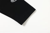 DAXUEN black mock neck pullover with bold wavy graphics